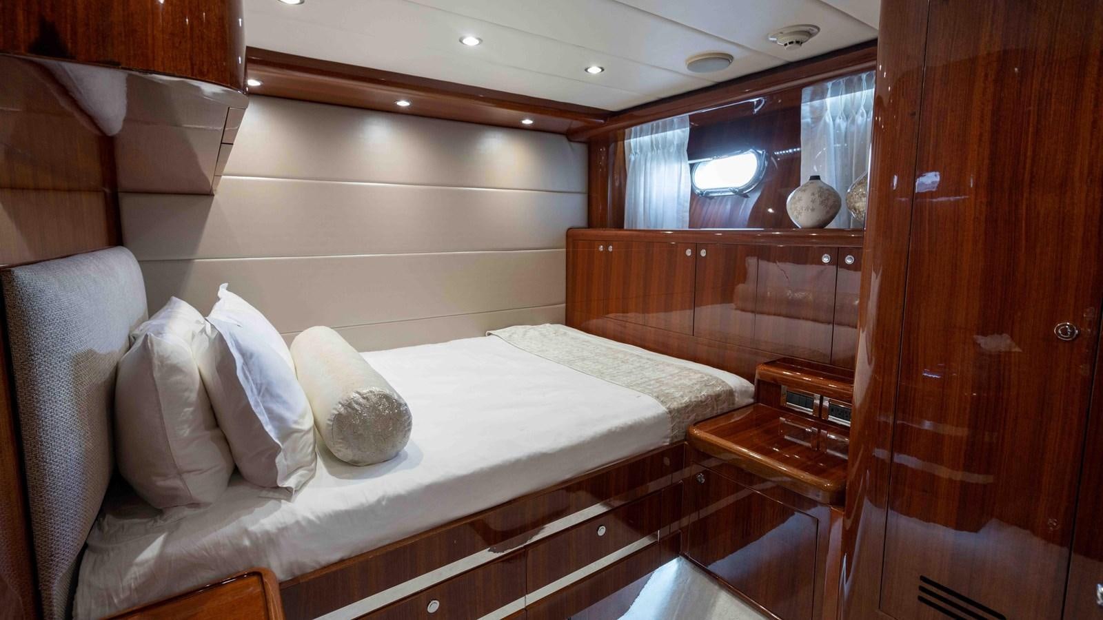 a bed in a room aboard NEVER SETTLE Yacht for Sale
