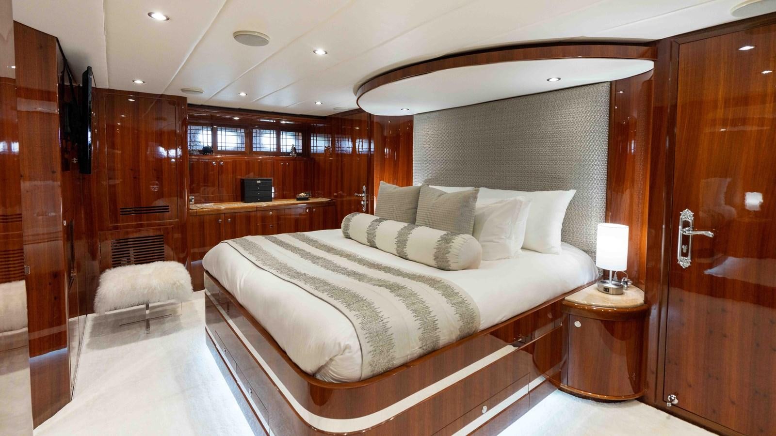 a bed in a room aboard NEVER SETTLE Yacht for Sale