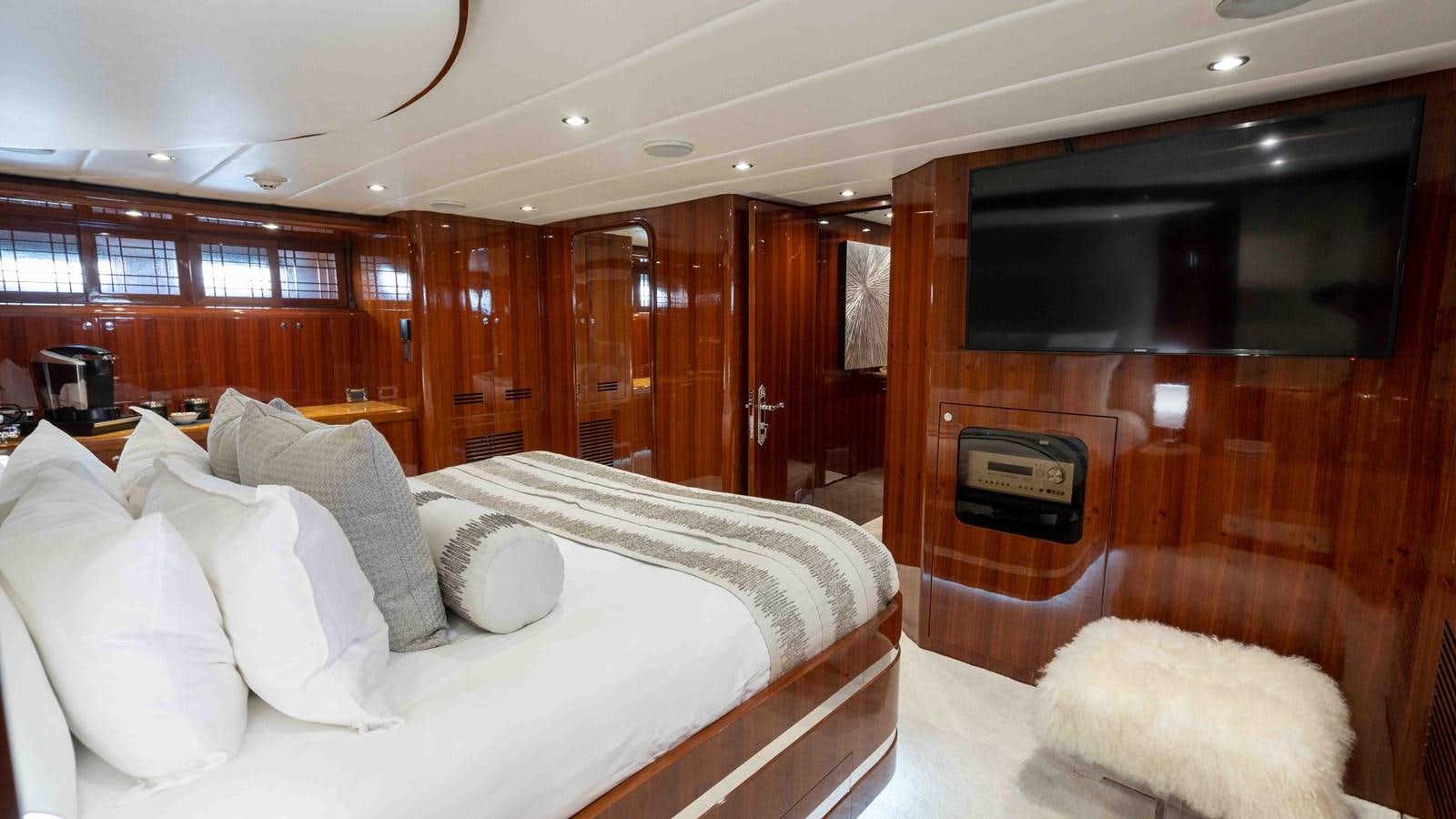 a bed in a room aboard NEVER SETTLE Yacht for Sale