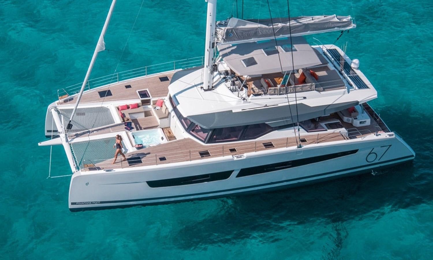 a white boat in the water aboard FOUNTAINE PAJOT ALEGRIA 67 Yacht for Sale