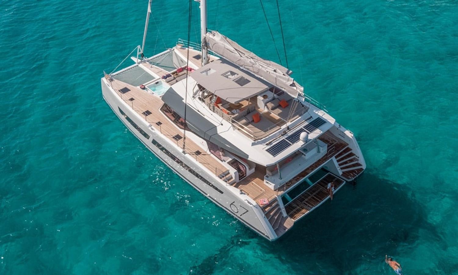 a boat in the ocean aboard FOUNTAINE PAJOT ALEGRIA 67 Yacht for Sale