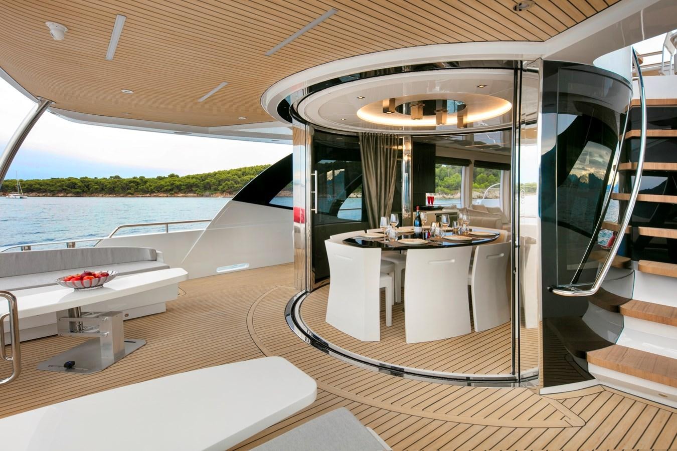 a room with a table and chairs aboard 2025 CANADOS 808’ MAXIMUS Yacht for Sale
