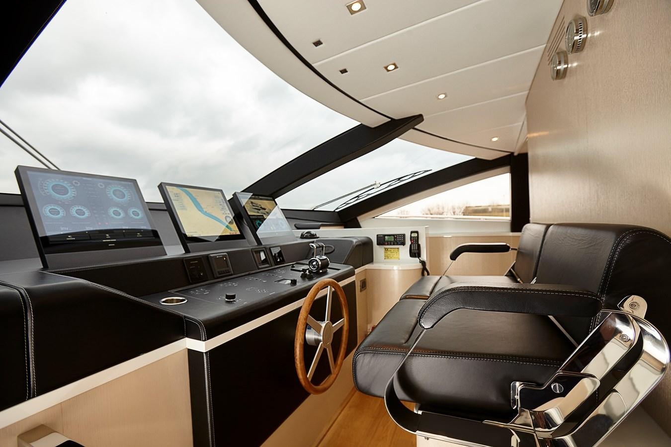 a room with a desk and computers aboard 2025 CANADOS 808’ MAXIMUS Yacht for Sale