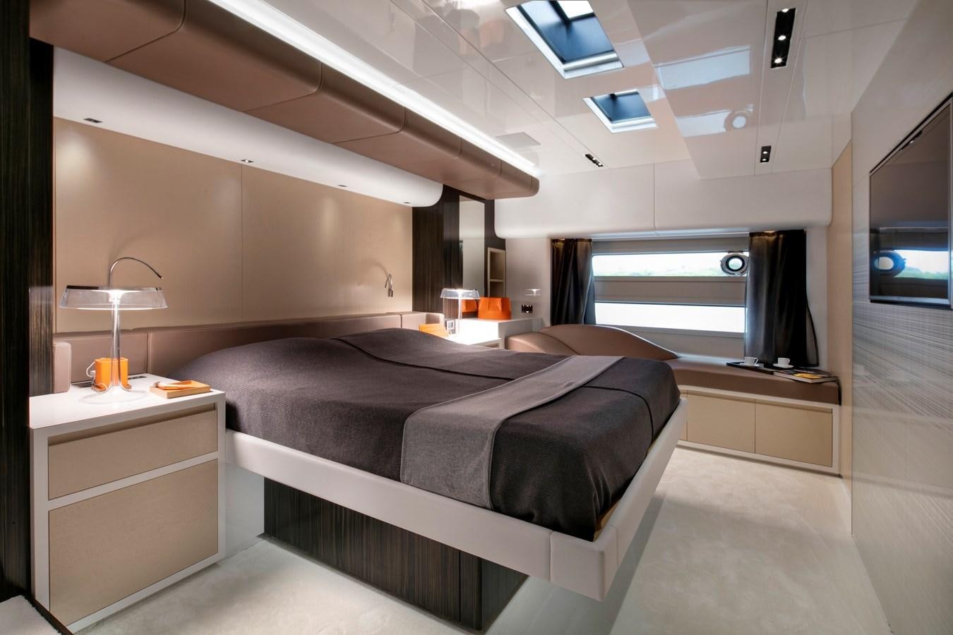 a bedroom with a bed and a window aboard 2025 CANADOS 808’ MAXIMUS Yacht for Sale