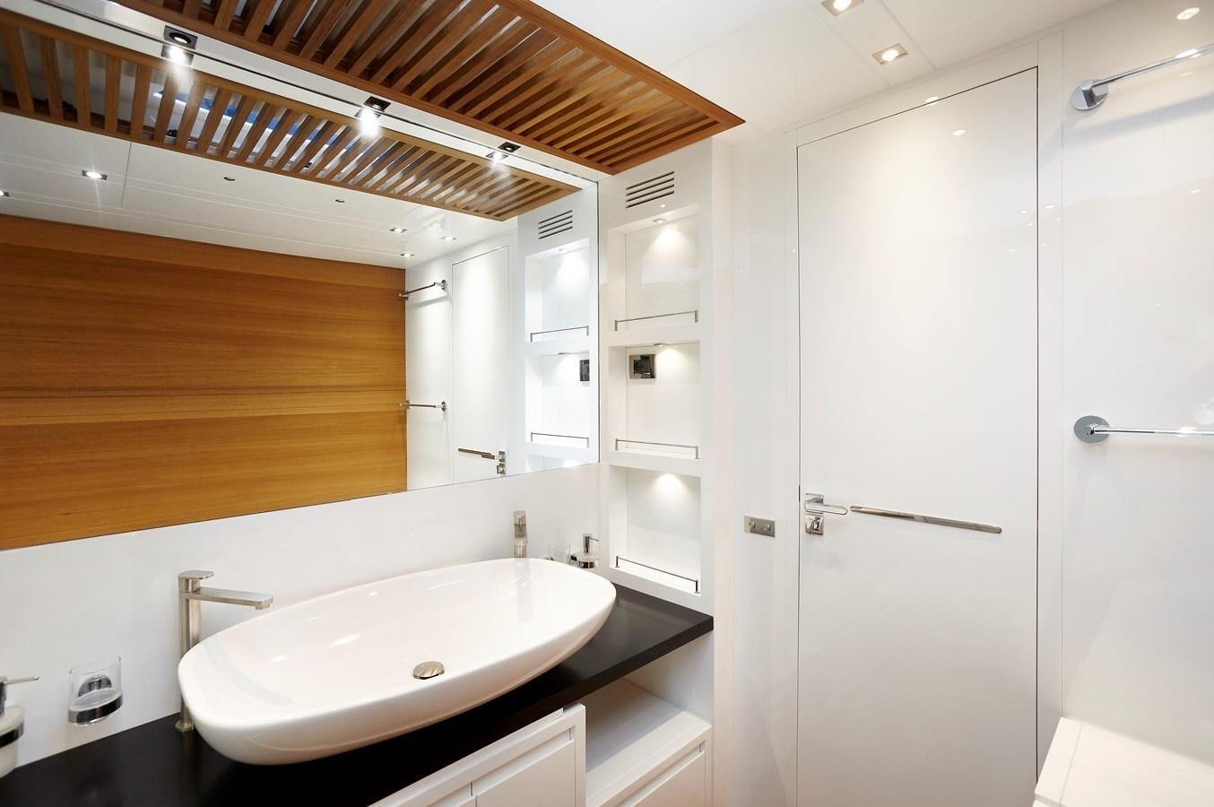 a bathroom with a sink and a mirror aboard 2025 CANADOS 808’ MAXIMUS Yacht for Sale