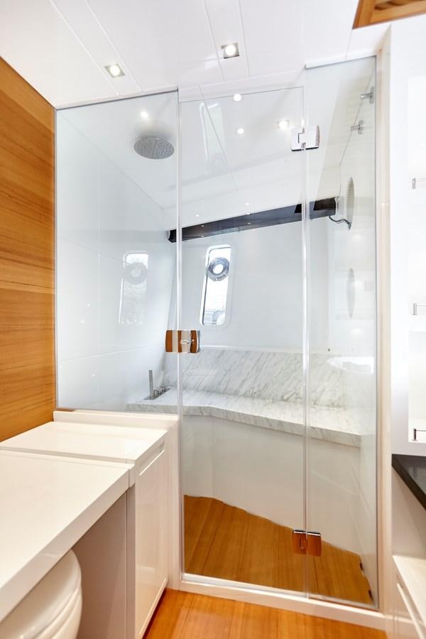 a bathroom with a glass shower aboard 2025 CANADOS 808’ MAXIMUS Yacht for Sale