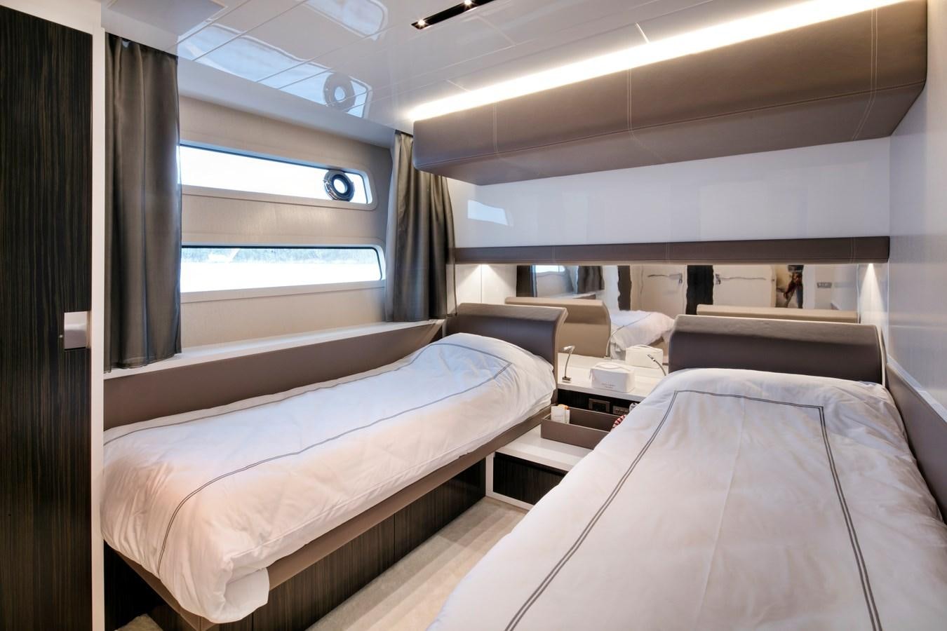 a room with two beds aboard 2025 CANADOS 808’ MAXIMUS Yacht for Sale