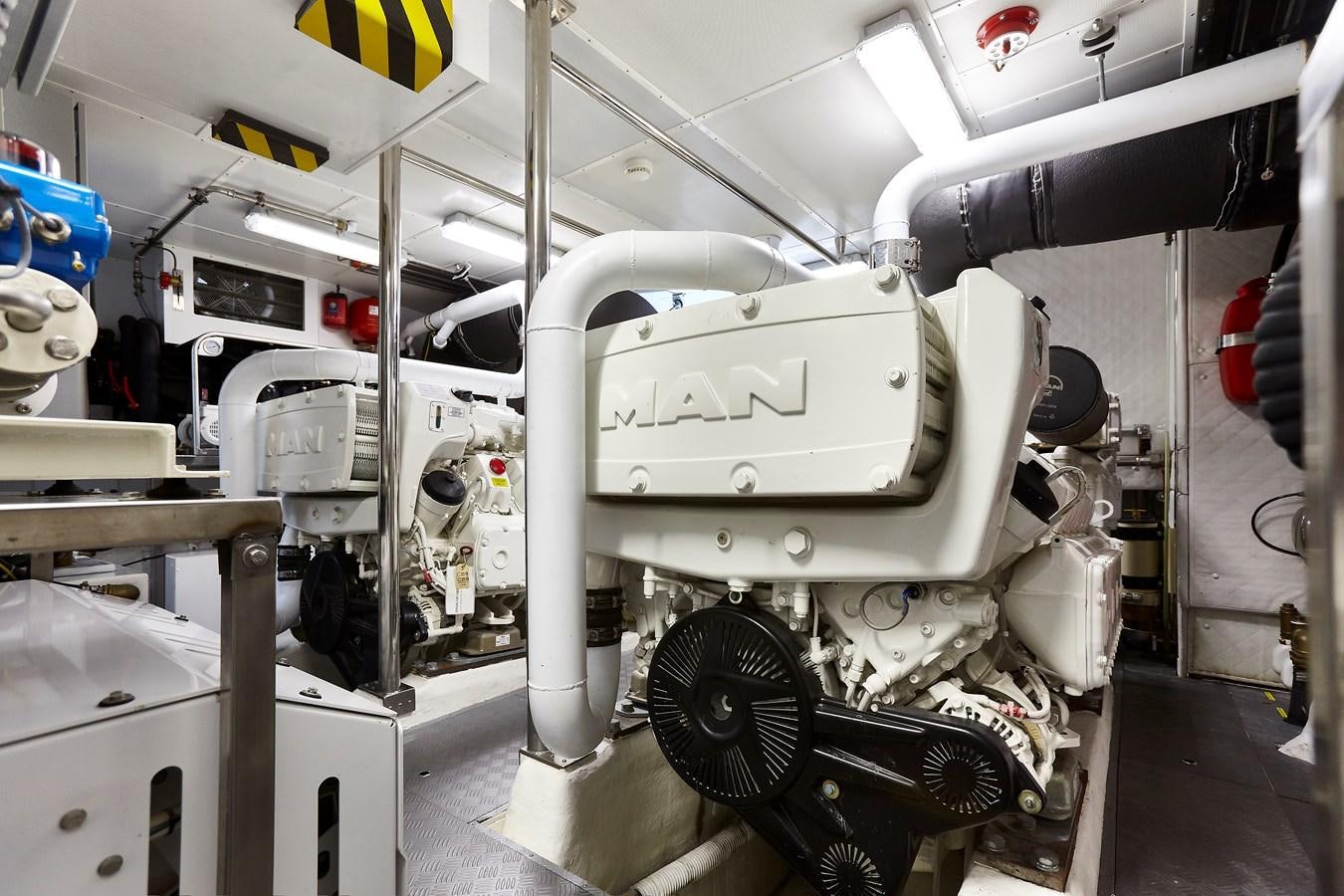 a white machine in a room aboard 2025 CANADOS 808’ MAXIMUS Yacht for Sale