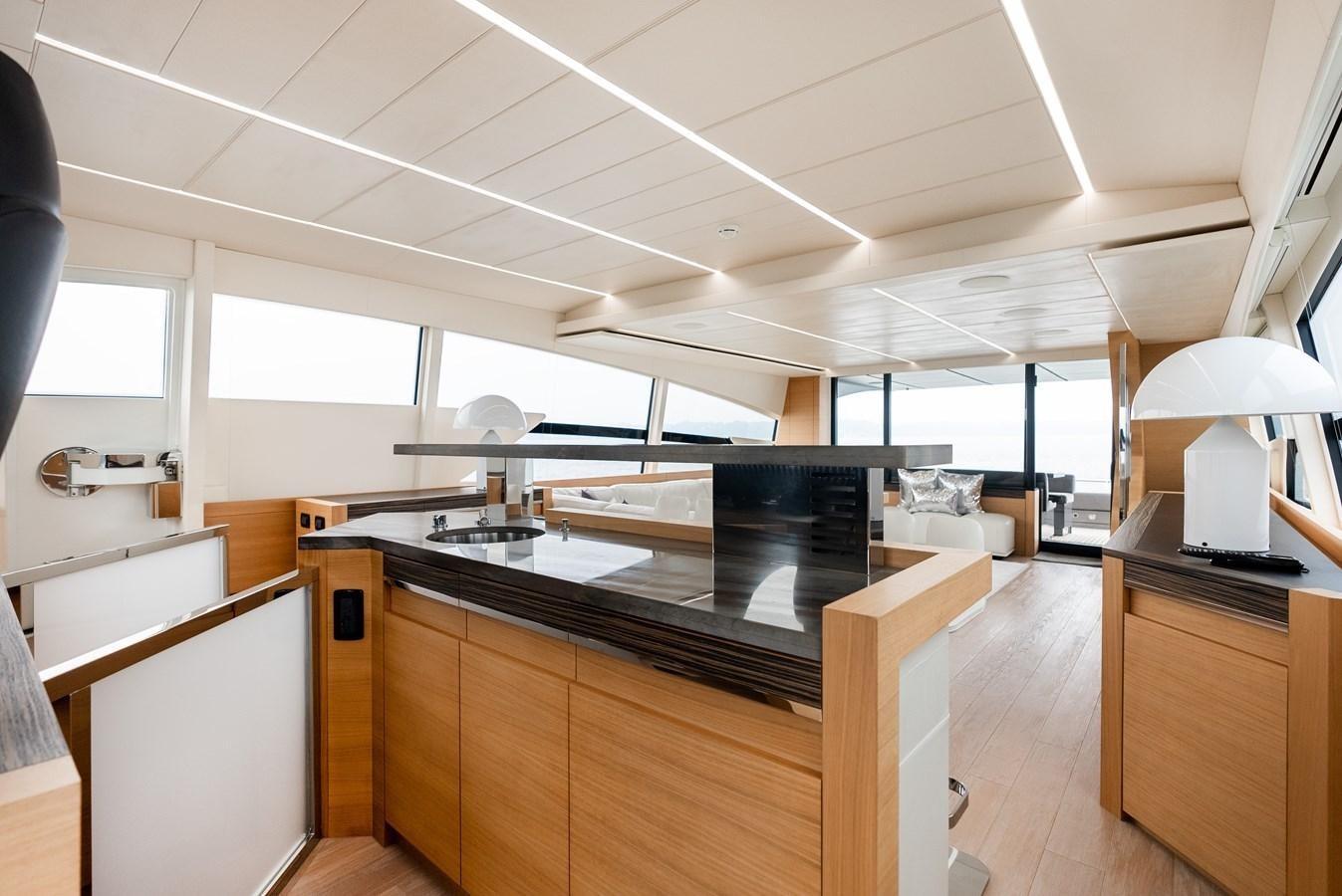 a kitchen with a large island aboard MORNINGSTAR Yacht for Sale