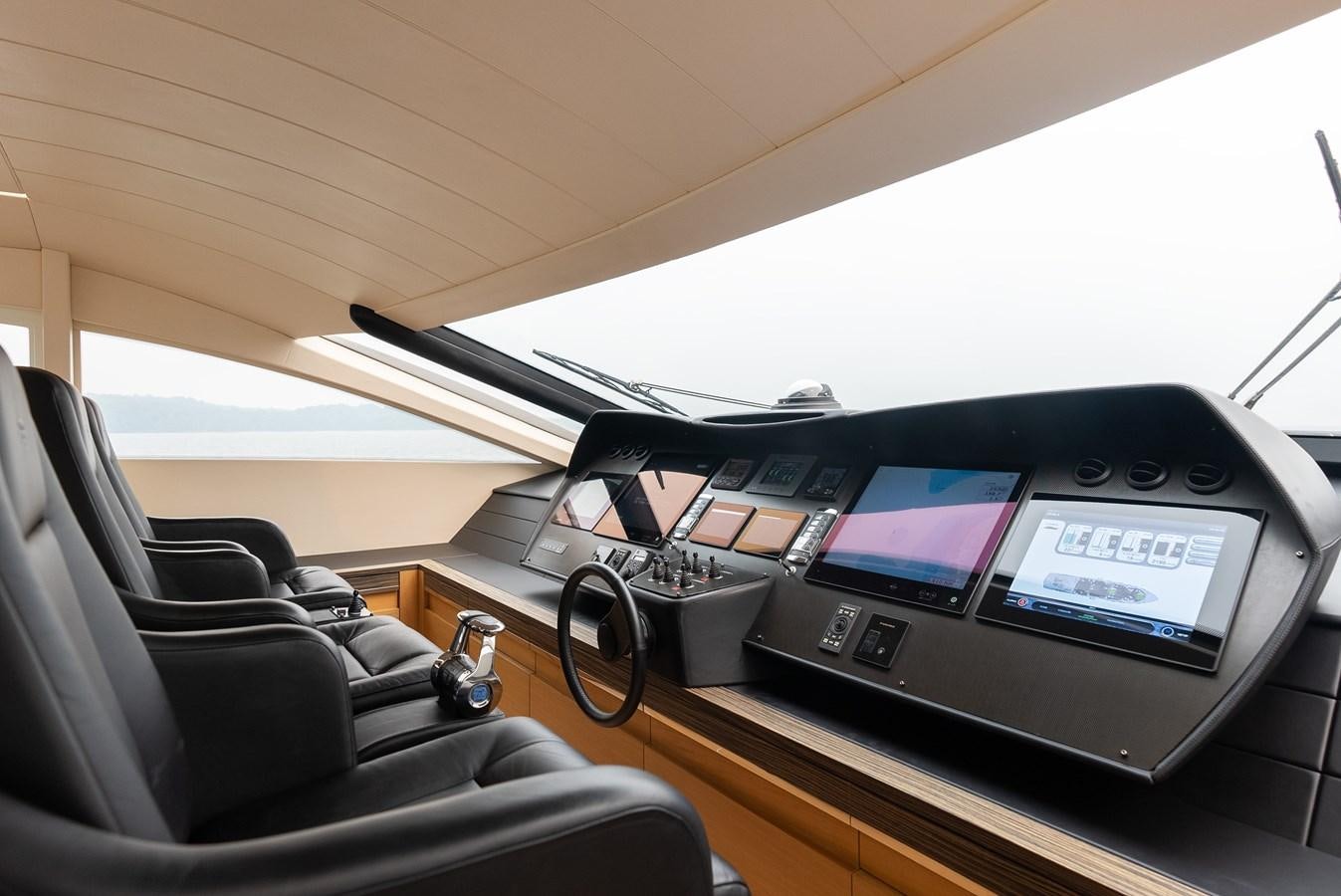 a car with a screen and a screen on the dashboard aboard MORNINGSTAR Yacht for Sale