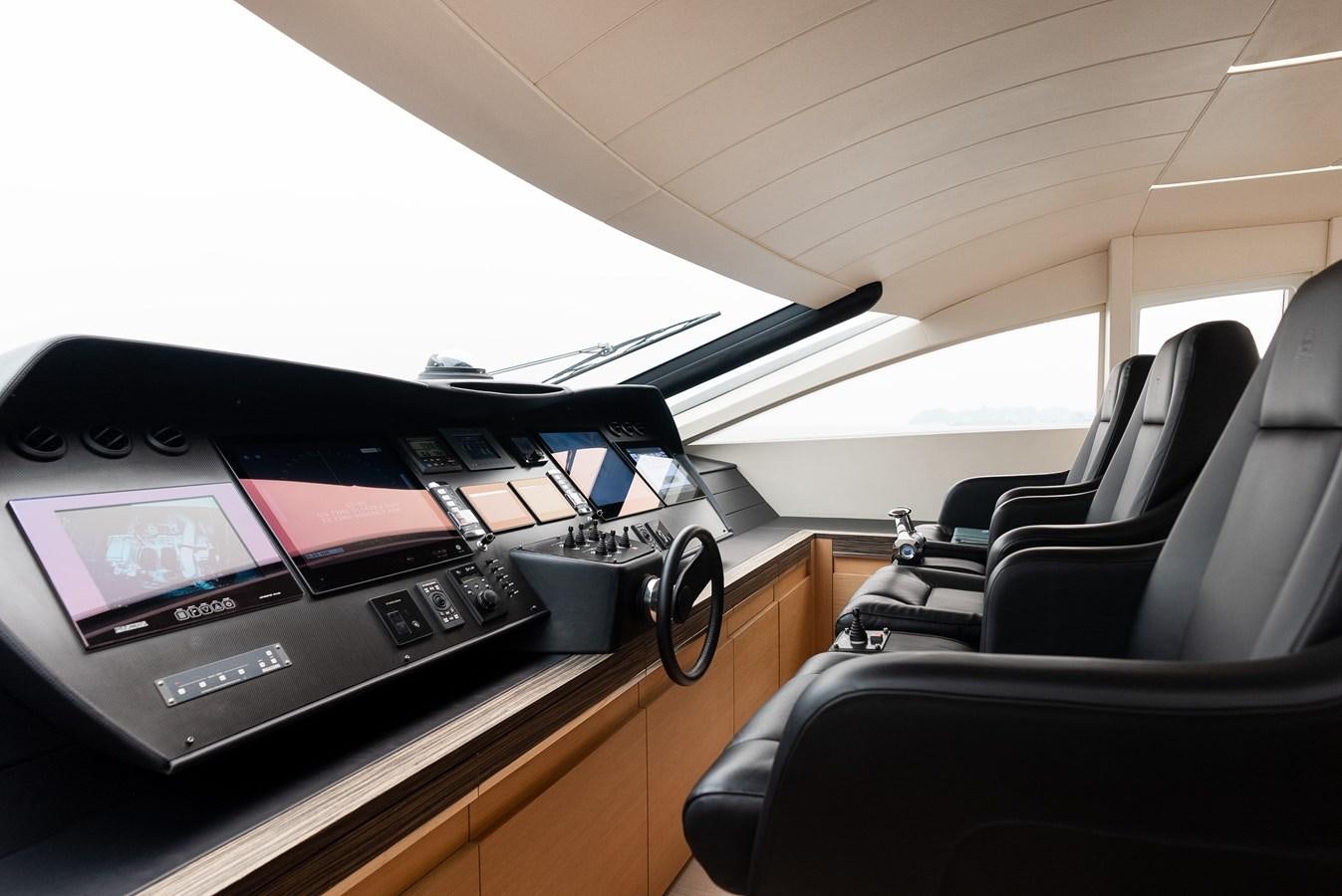 a car with a screen on the dashboard aboard MORNINGSTAR Yacht for Sale