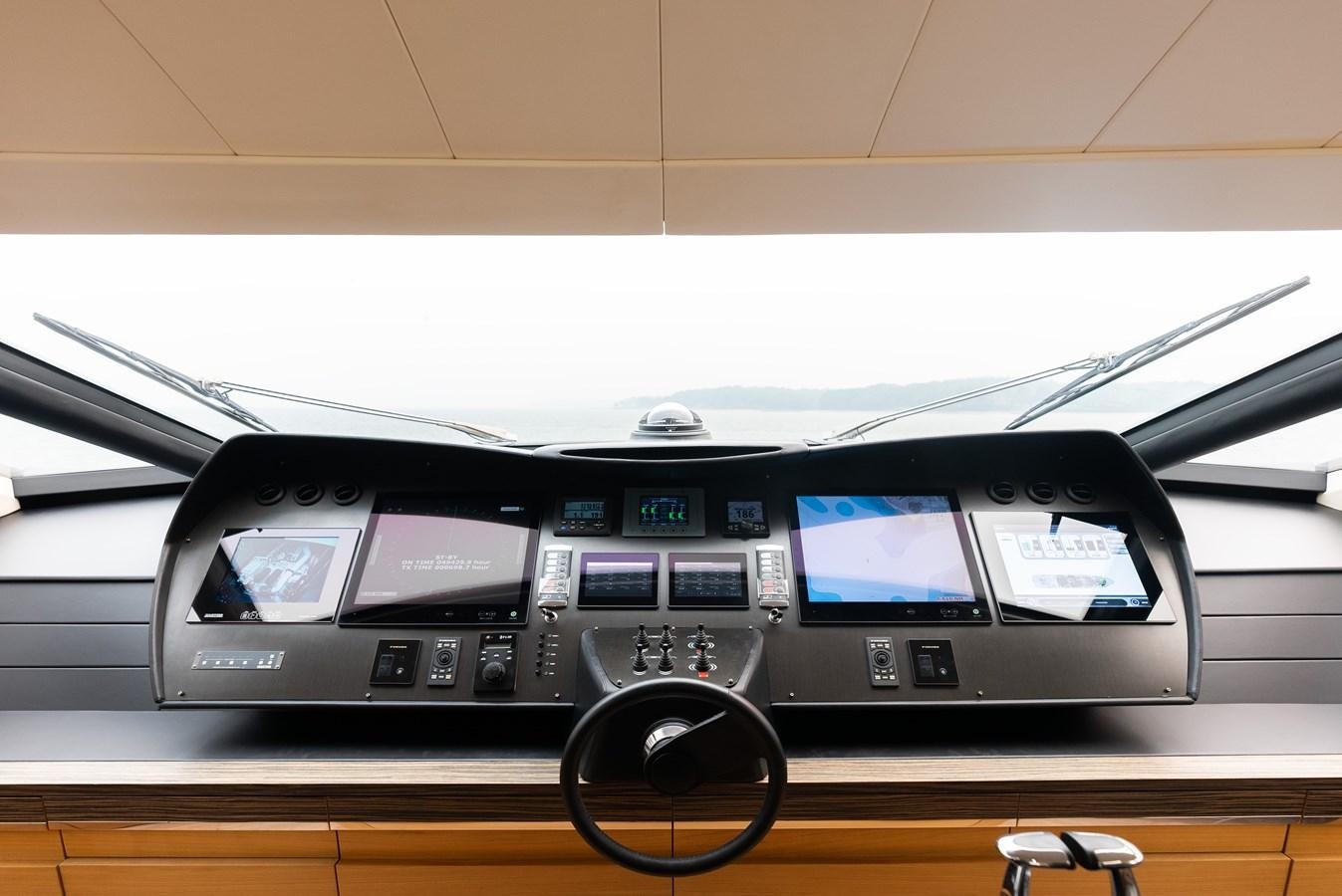 a car with a screen and a screen on the dashboard aboard MORNINGSTAR Yacht for Sale
