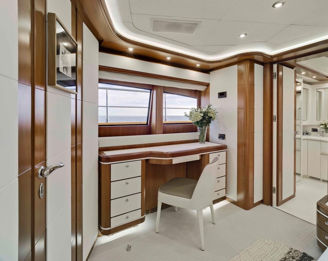 a white office with a desk aboard BUNKER Yacht for Sale