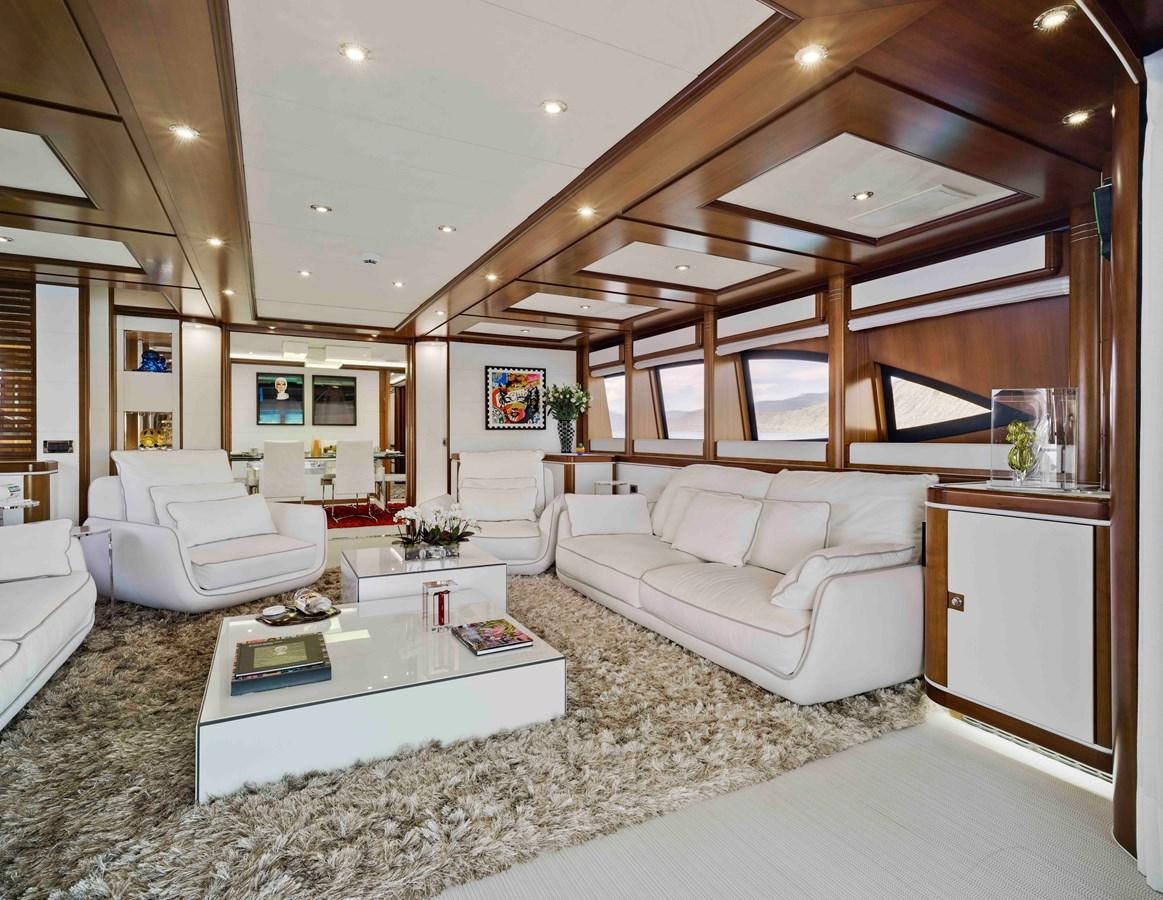 a living room with a large open ceiling aboard BUNKER Yacht for Sale