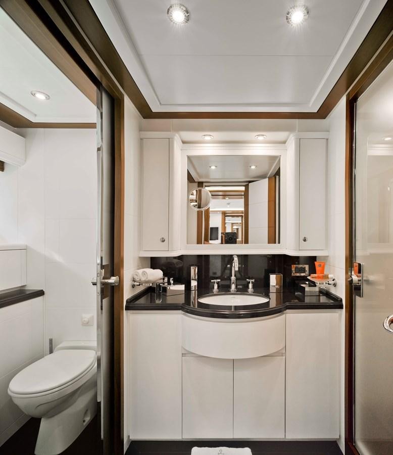 a bathroom with a sink and a toilet aboard BUNKER Yacht for Sale