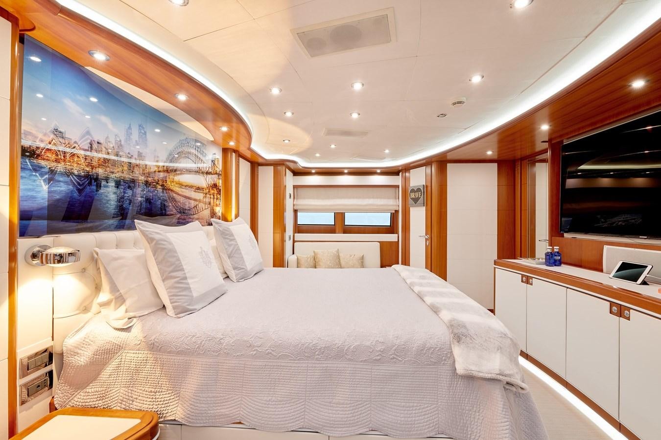 a room with a bed and a desk aboard BUNKER Yacht for Sale