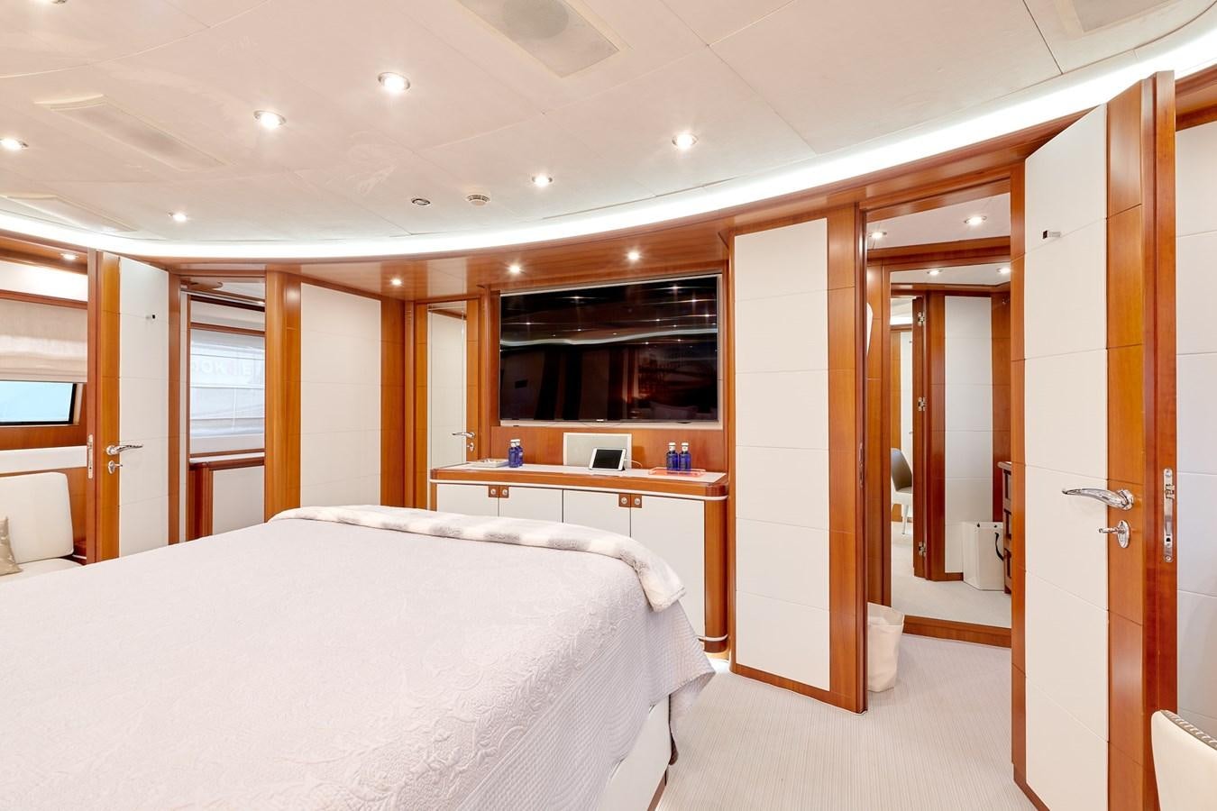 a room with a bed and a closet aboard BUNKER Yacht for Sale