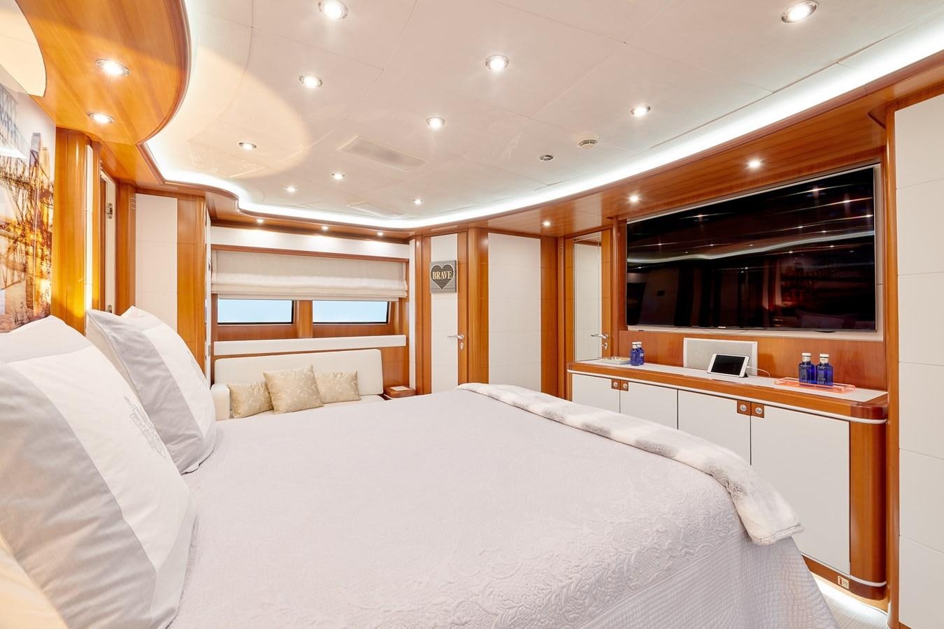 a room with a bed and a desk aboard BUNKER Yacht for Sale