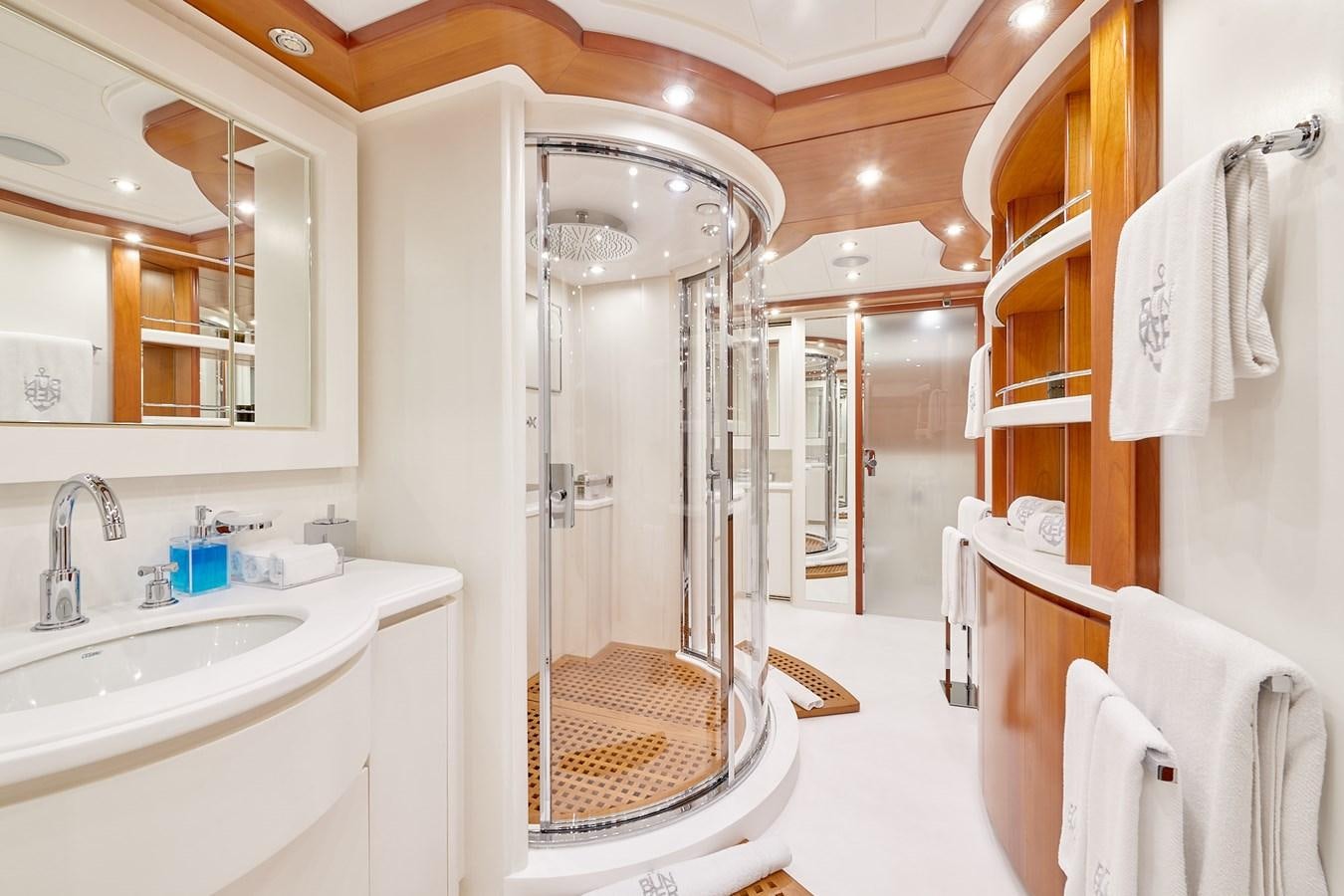 a bathroom with a shower and sink aboard BUNKER Yacht for Sale