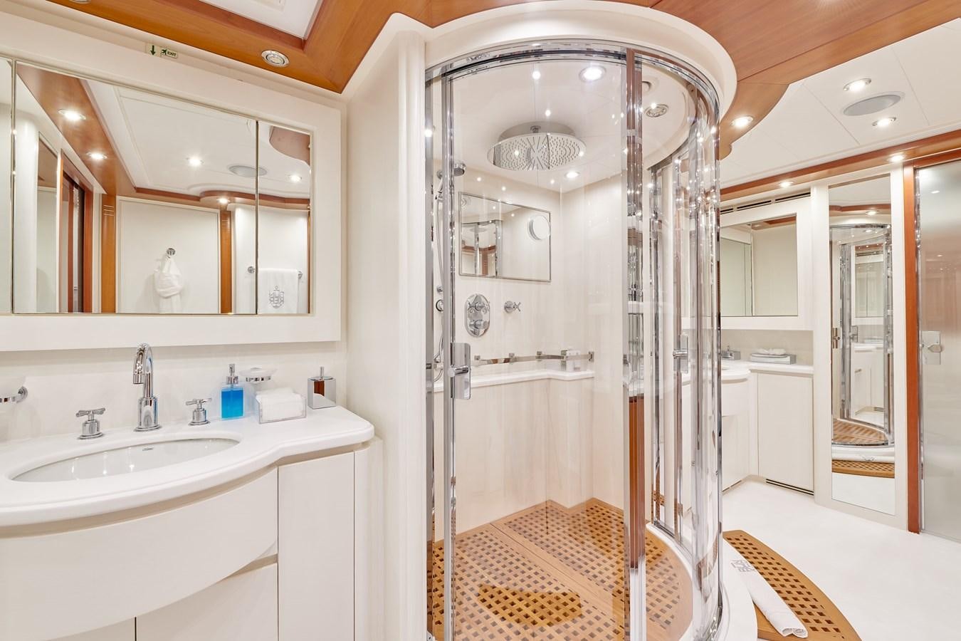 a bathroom with a shower unit aboard BUNKER Yacht for Sale
