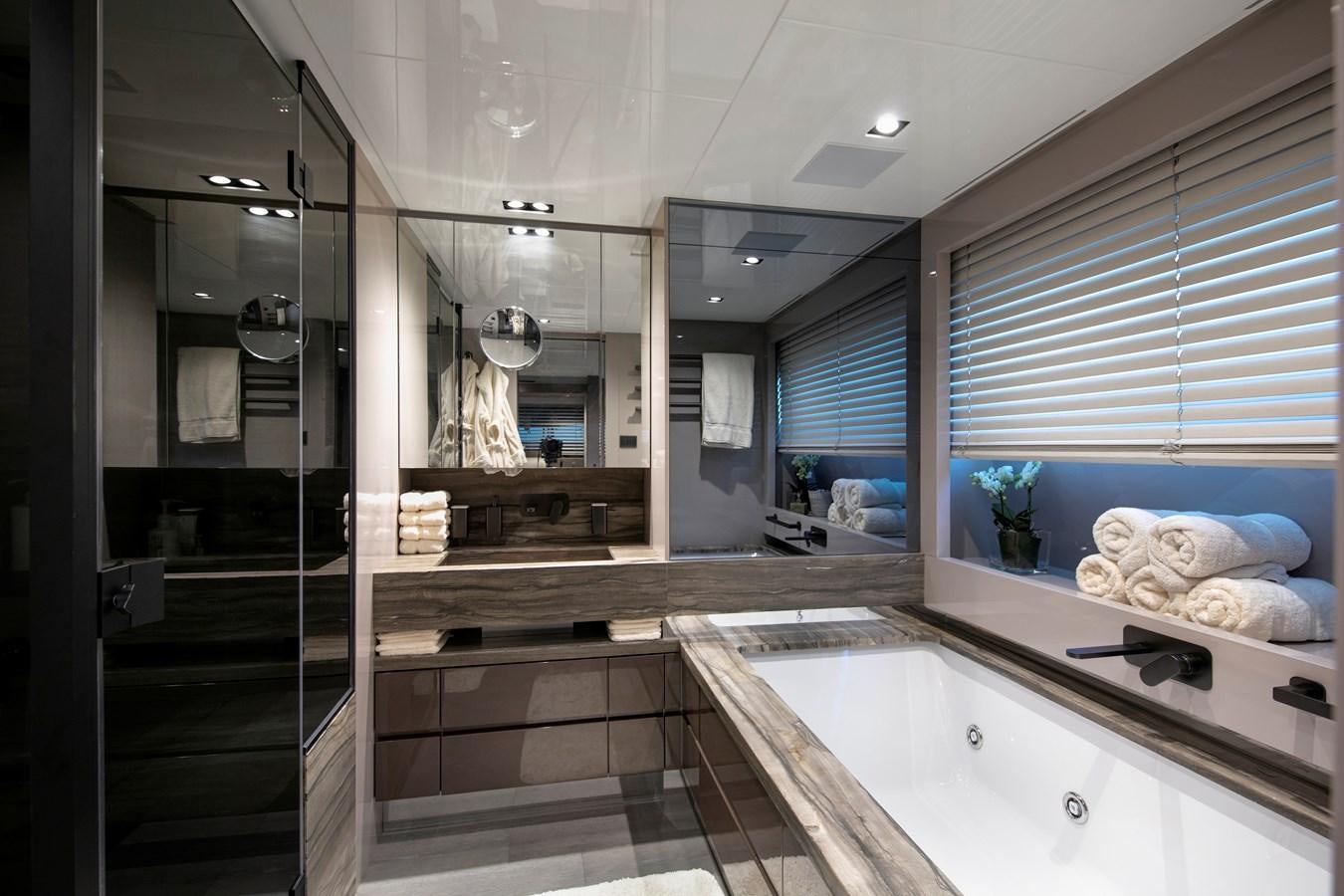 a bathroom with a large countertop aboard CANADOS 122’ CAESAR RPH Yacht for Sale