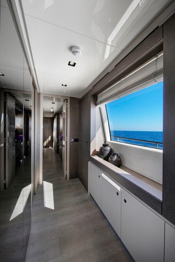a bathroom with a large window aboard CANADOS 122’ CAESAR RPH Yacht for Sale