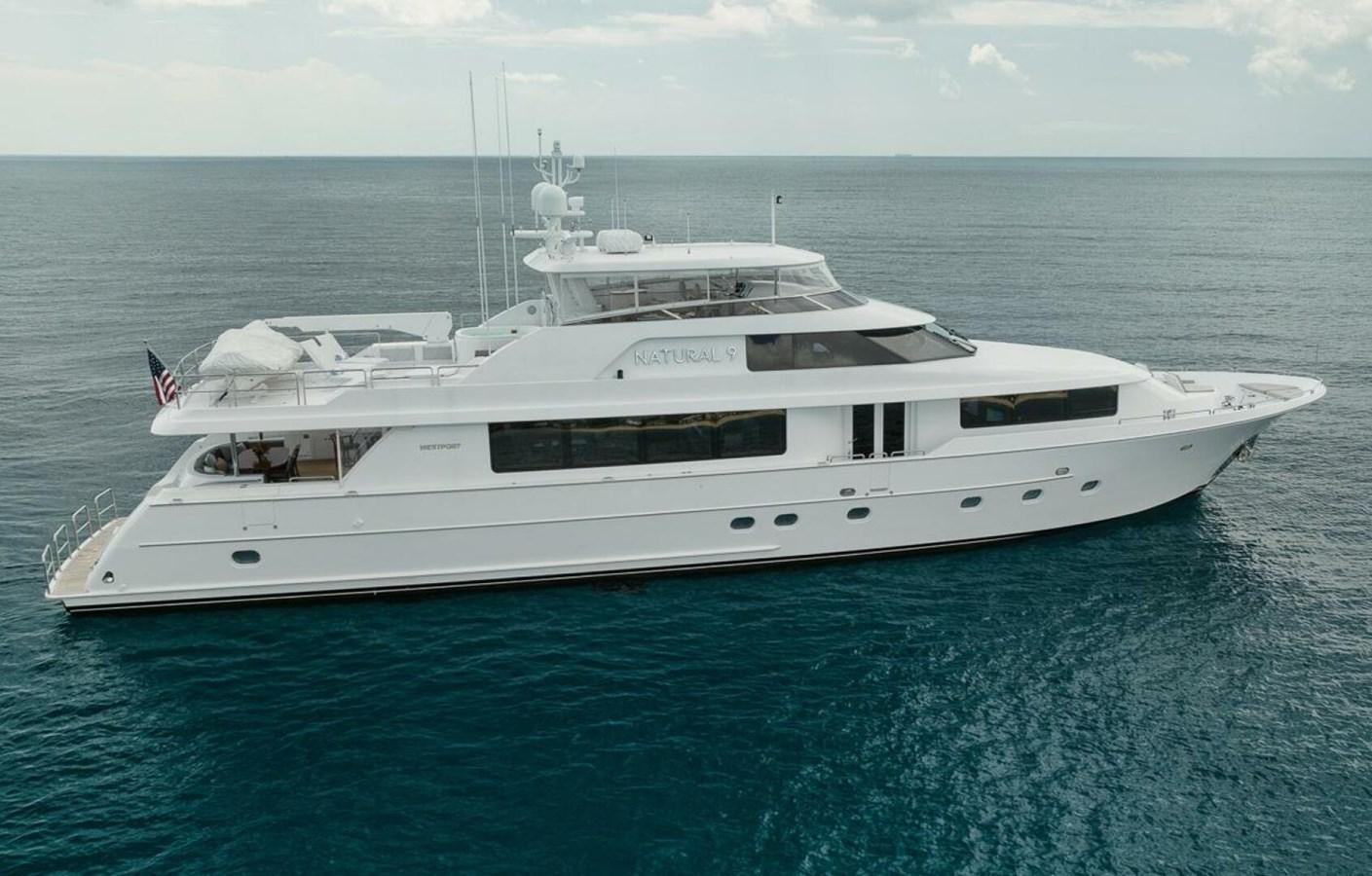 a white yacht in the water aboard NATURAL 9 Yacht for Sale