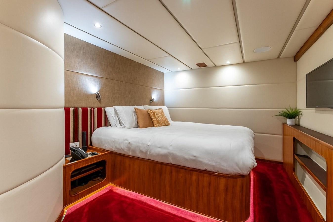 a room with two beds aboard HARDHOME Yacht for Sale