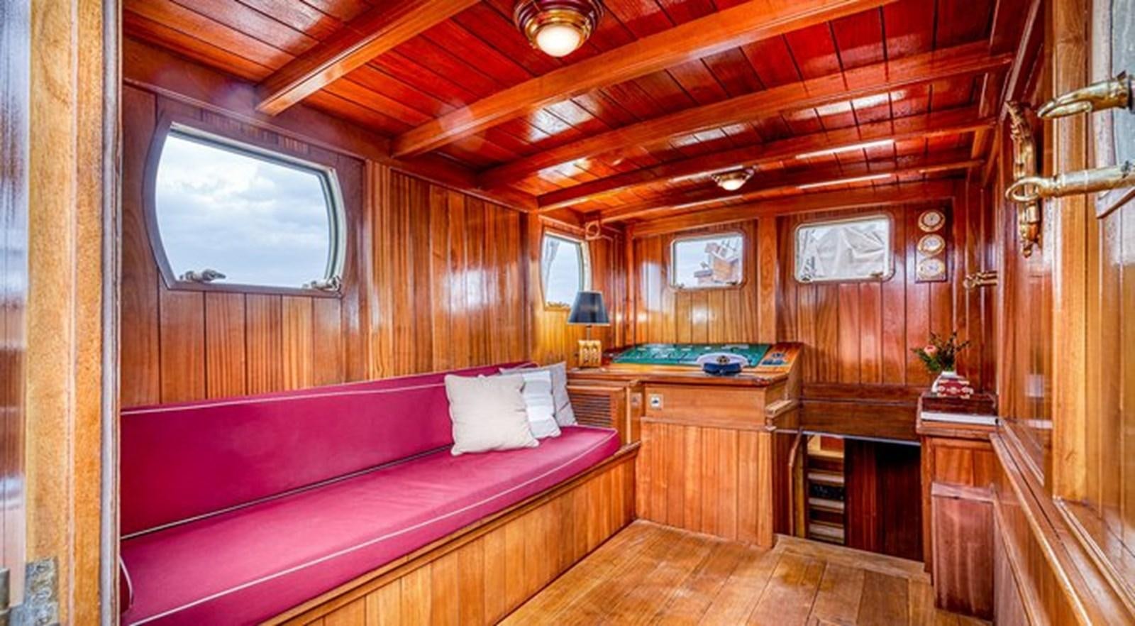 a room with a bed and a desk aboard O'REMINGTON Yacht for Sale