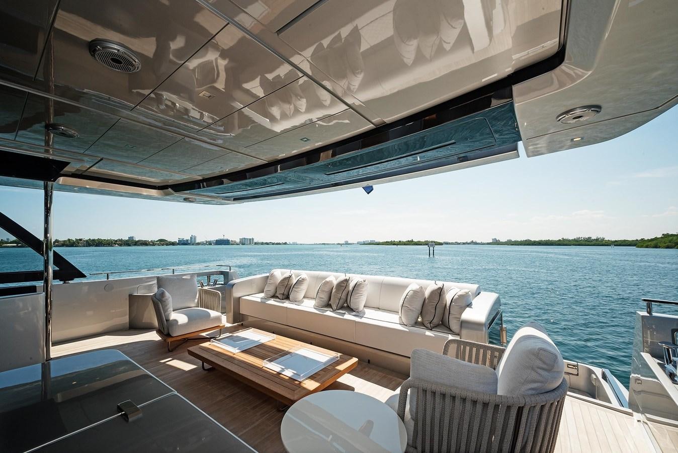 a large living room with a large balcony overlooking the ocean aboard ALLEGRA Yacht for Sale
