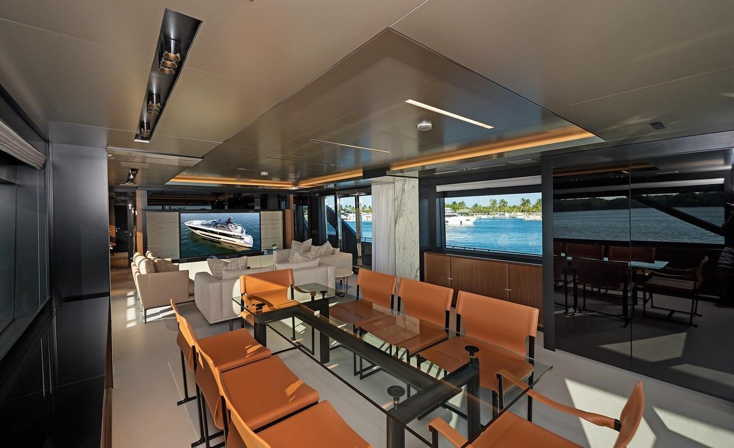 a room with tables and chairs aboard ALLEGRA Yacht for Sale
