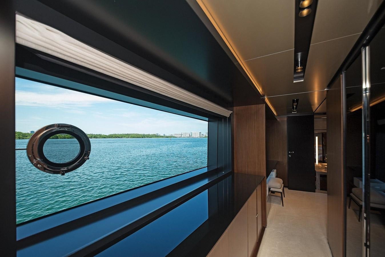 a room with a large blue pool aboard ALLEGRA Yacht for Sale