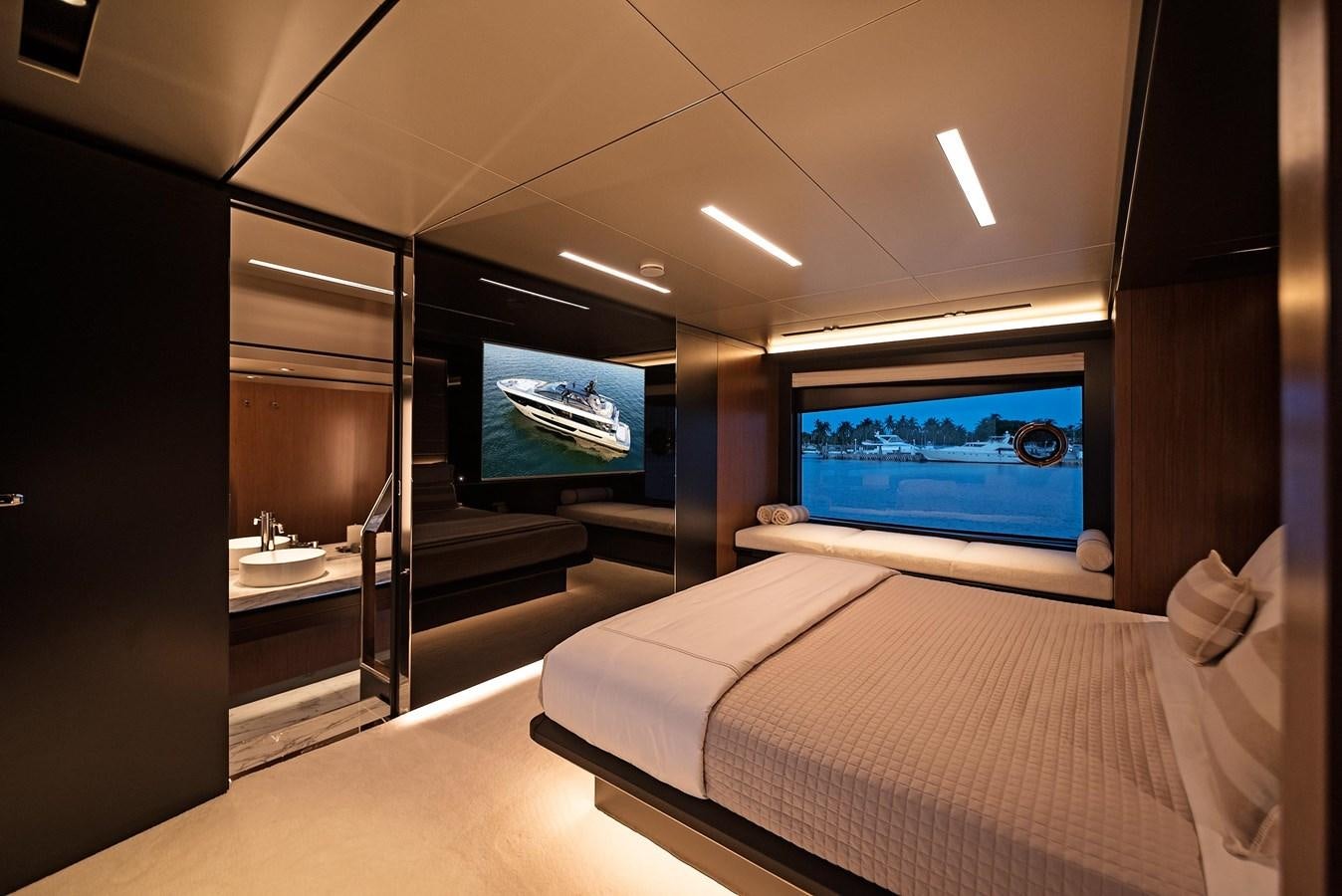 a room with a bed and a tv aboard ALLEGRA Yacht for Sale