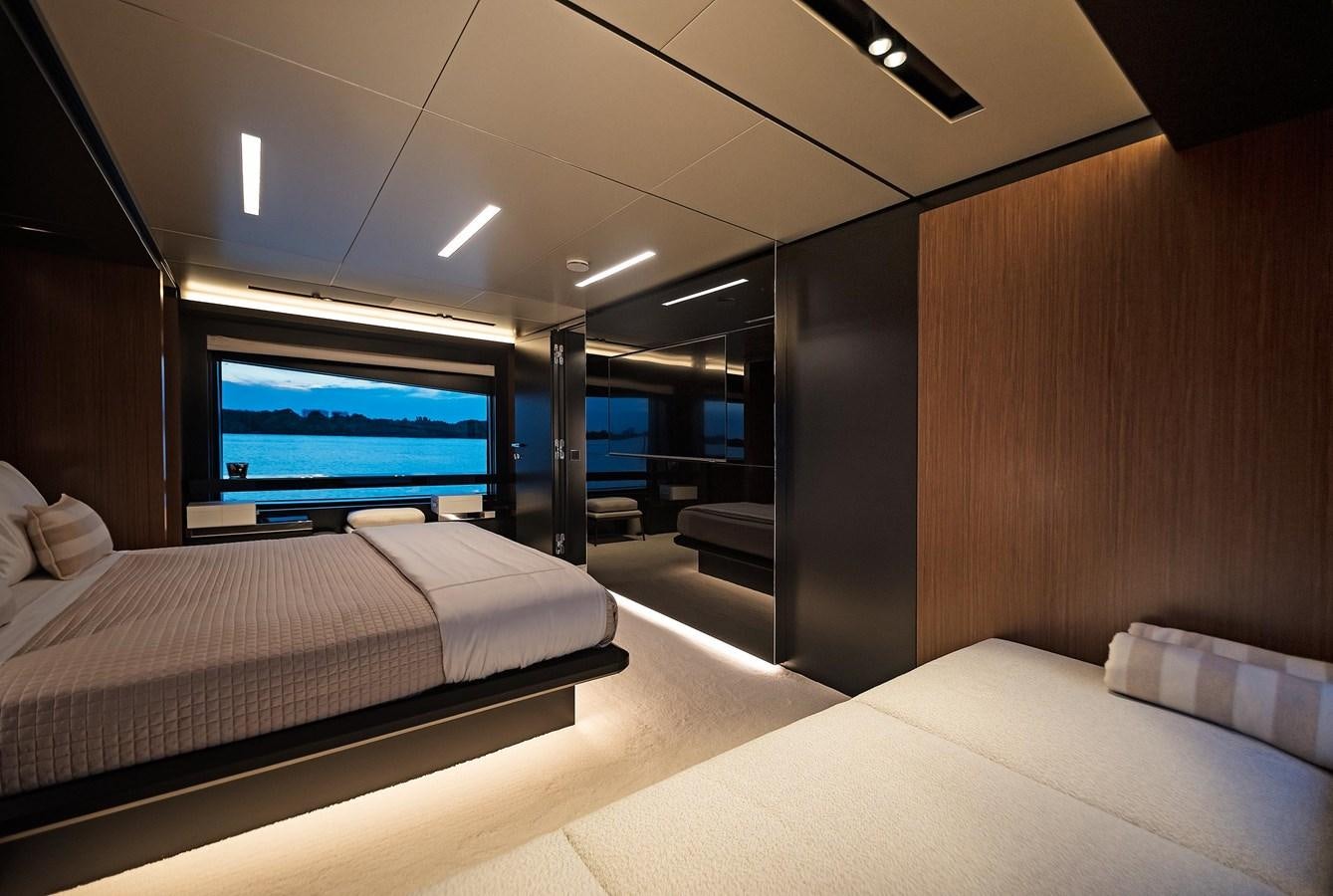 a room with a bed and a tv aboard ALLEGRA Yacht for Sale