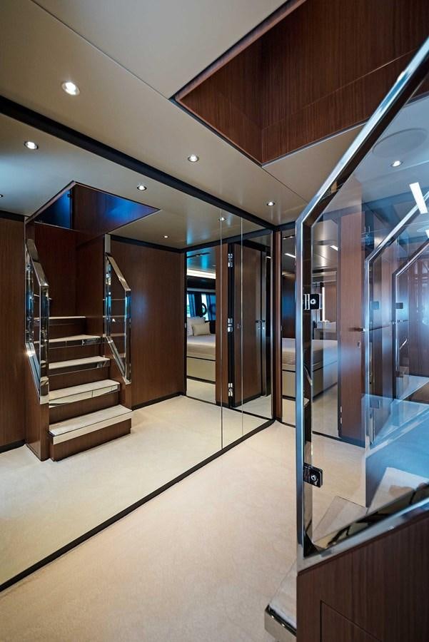 a hallway with glass doors aboard ALLEGRA Yacht for Sale