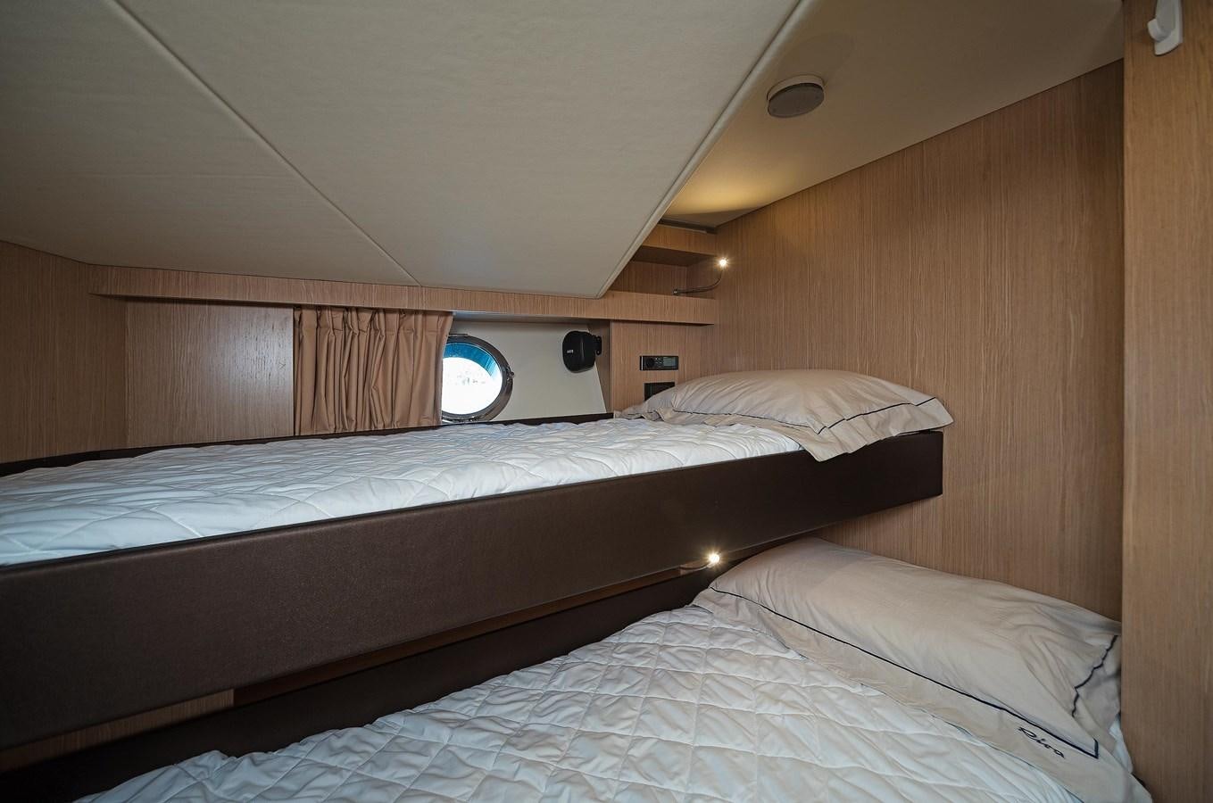 a room with two beds aboard ALLEGRA Yacht for Sale