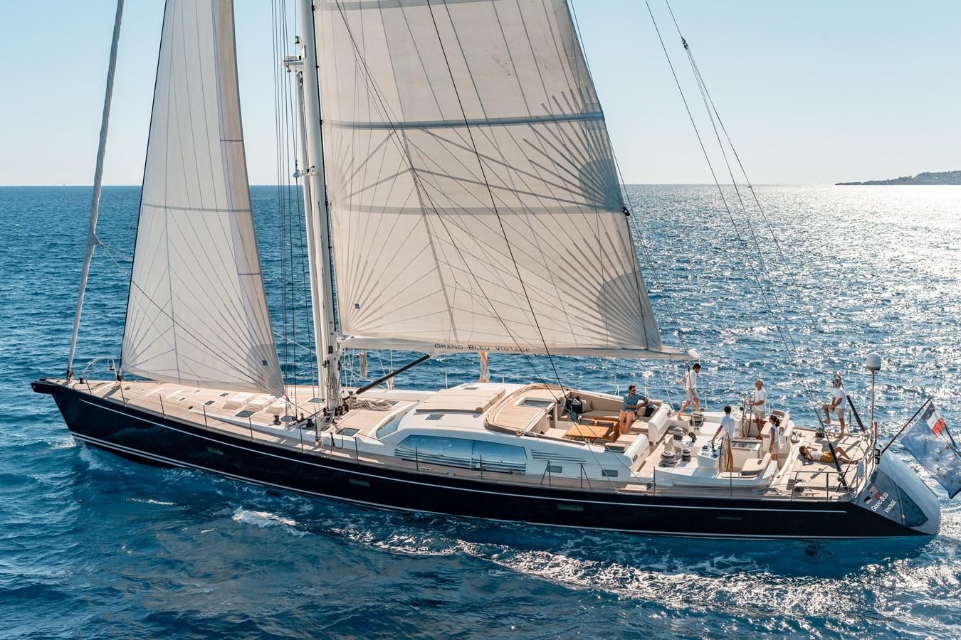 a boat sailing on the sea aboard GRAND BLEU VINTAGE Yacht for Sale