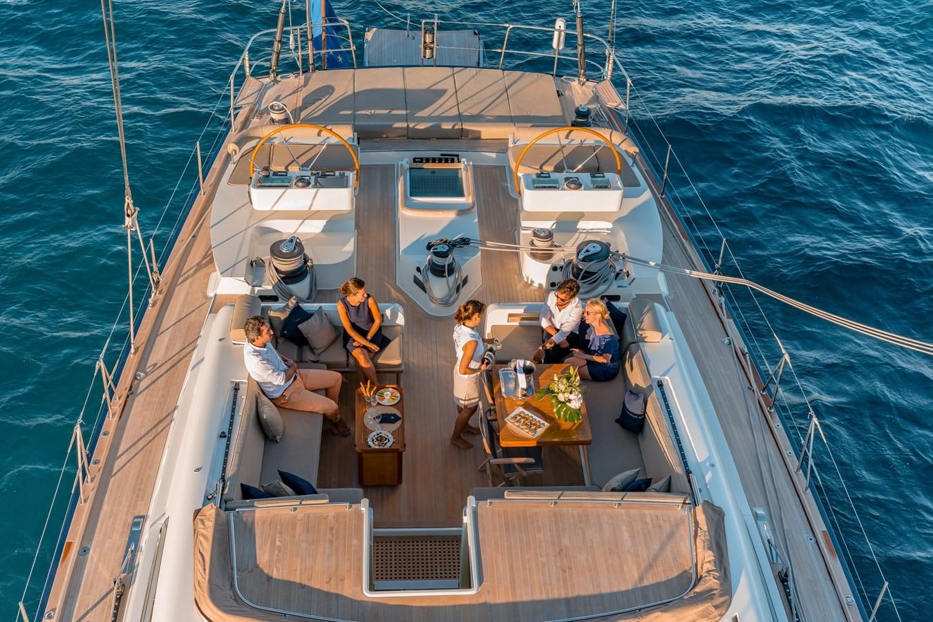 a group of people on a boat aboard GRAND BLEU VINTAGE Yacht for Sale