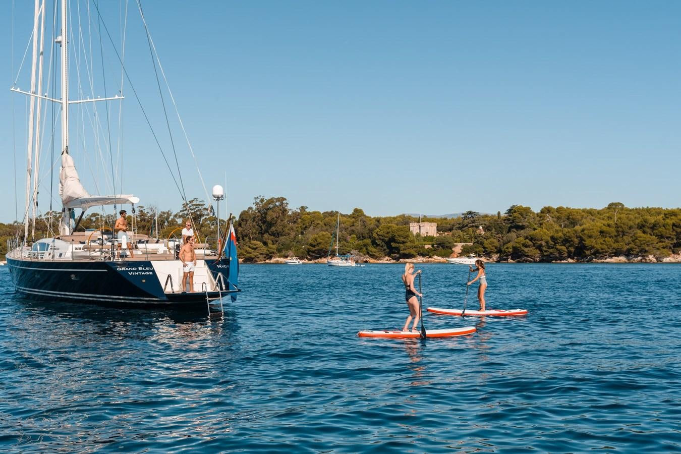 a couple of people on a boat aboard GRAND BLEU VINTAGE Yacht for Sale