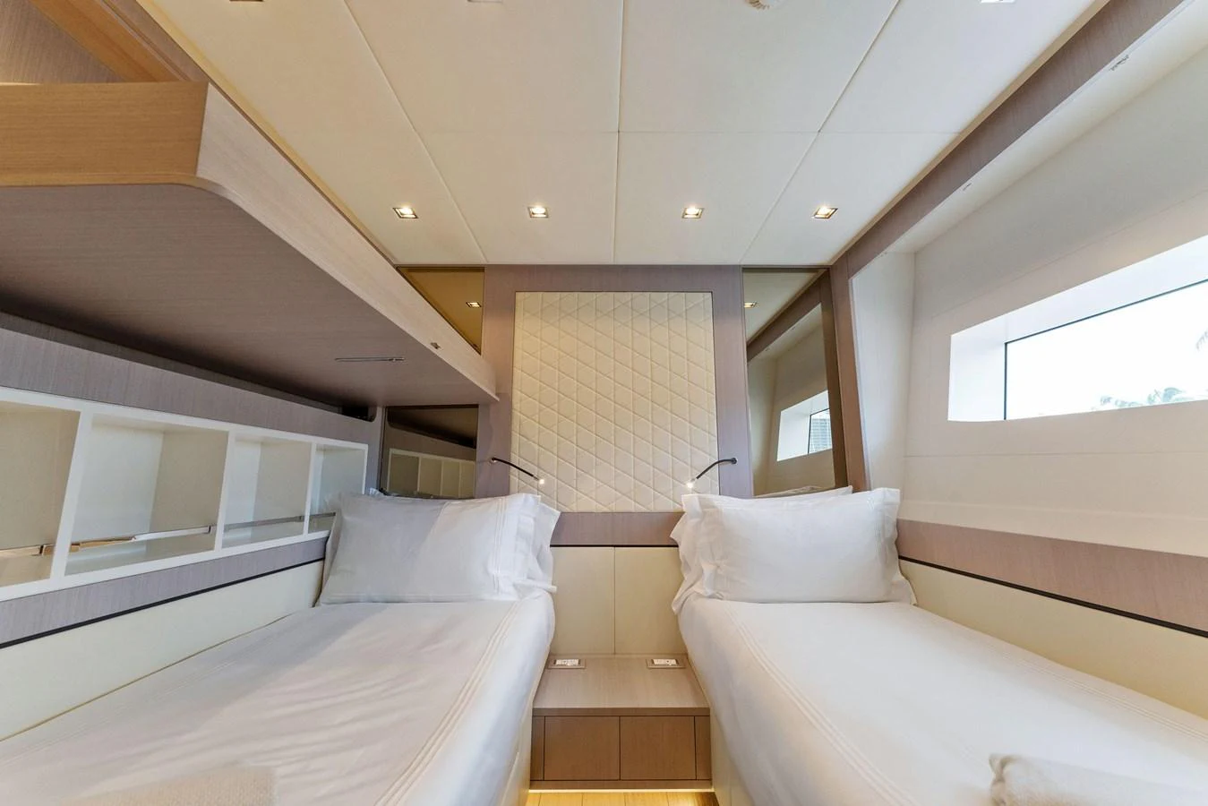 a room with several beds aboard LADY K Yacht for Sale