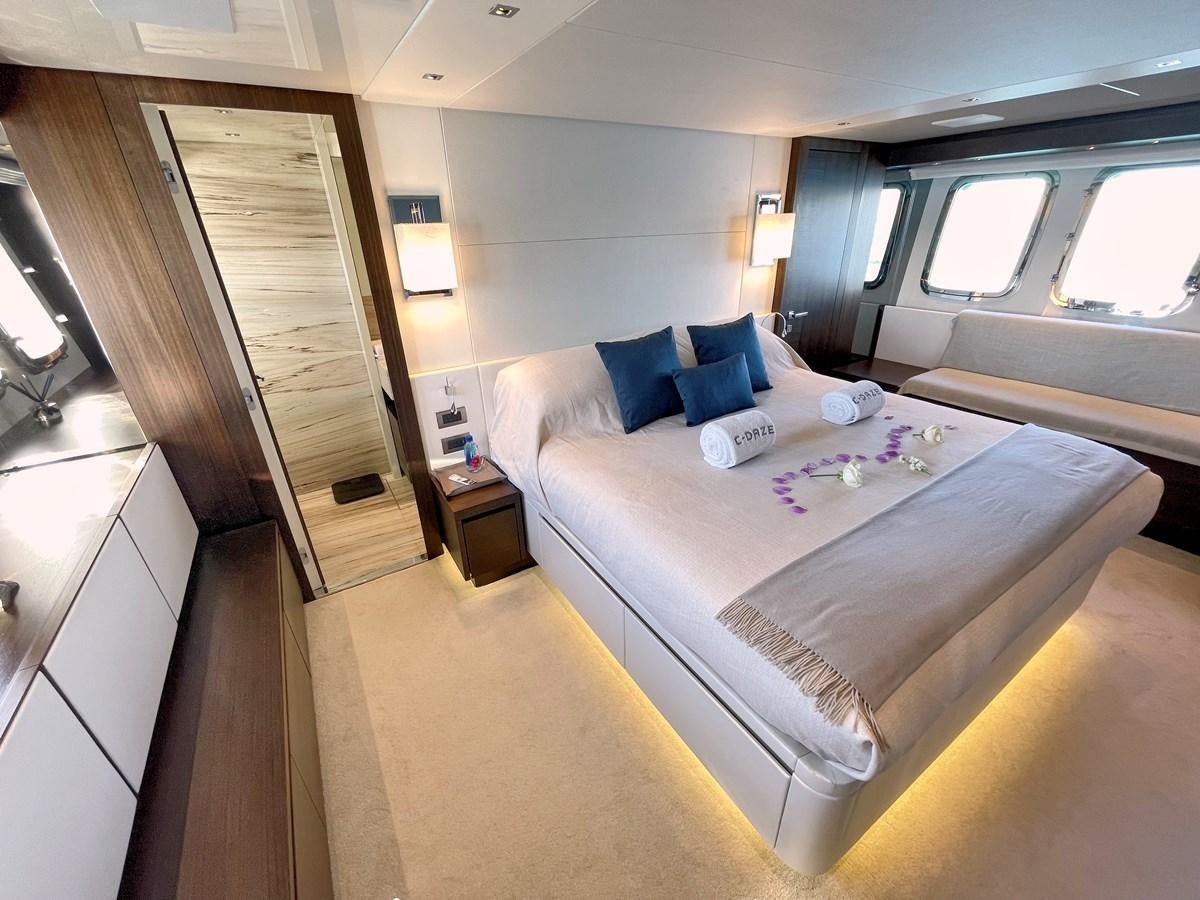 a bed in a room aboard C-DAZE Yacht for Sale