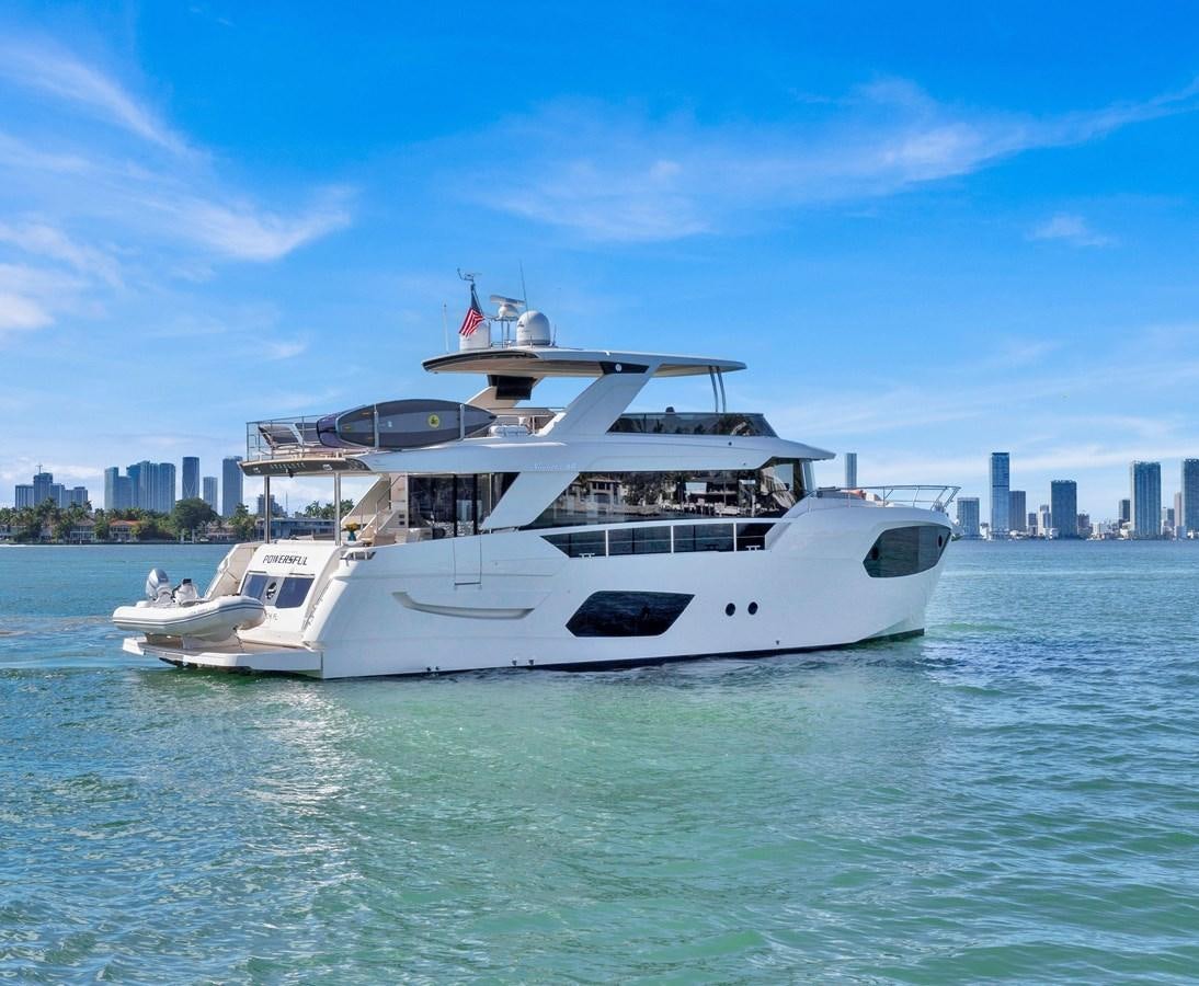 a white yacht in the water aboard POWERSFUL Yacht for Sale