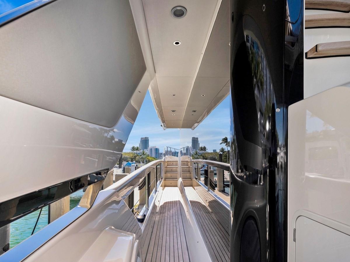 a large airplane with a large deck aboard POWERSFUL Yacht for Sale