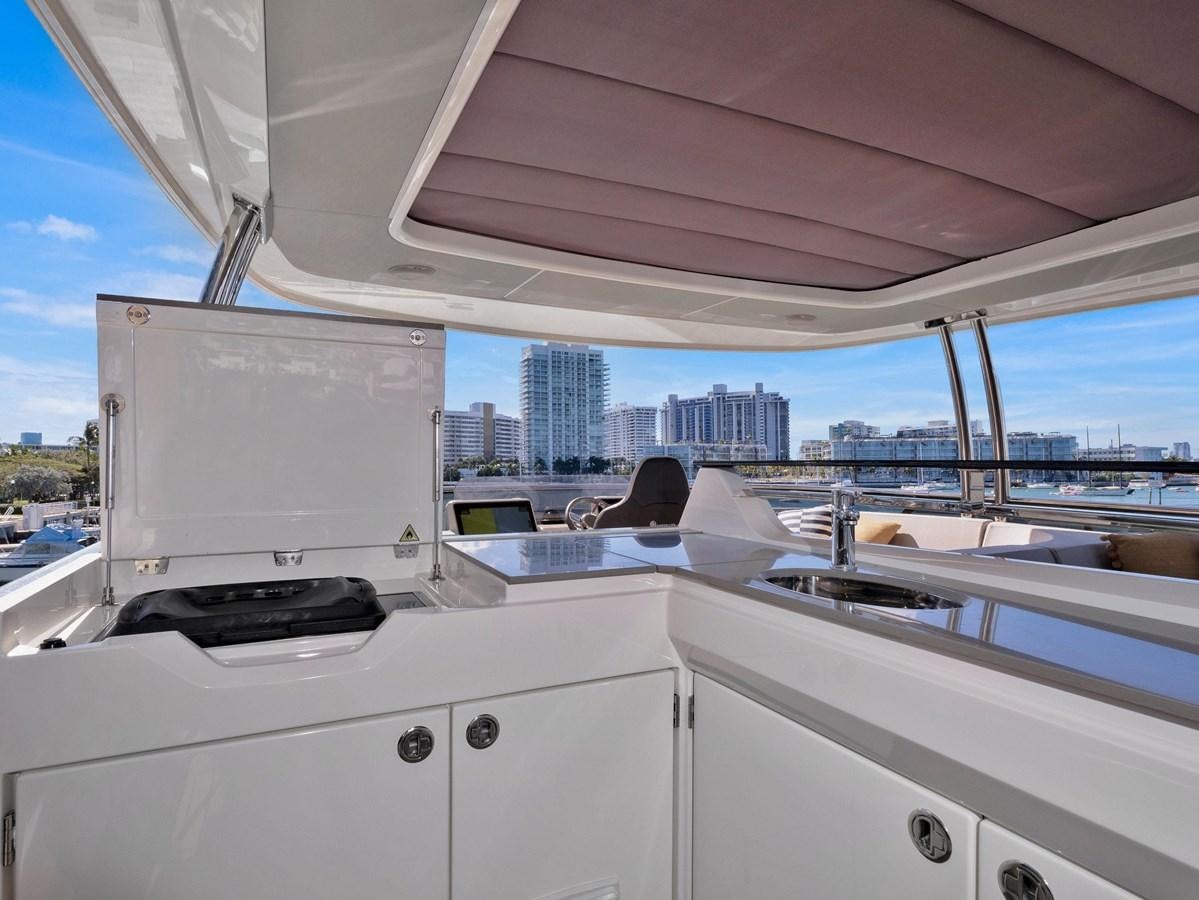 a boat with a laptop on it aboard POWERSFUL Yacht for Sale