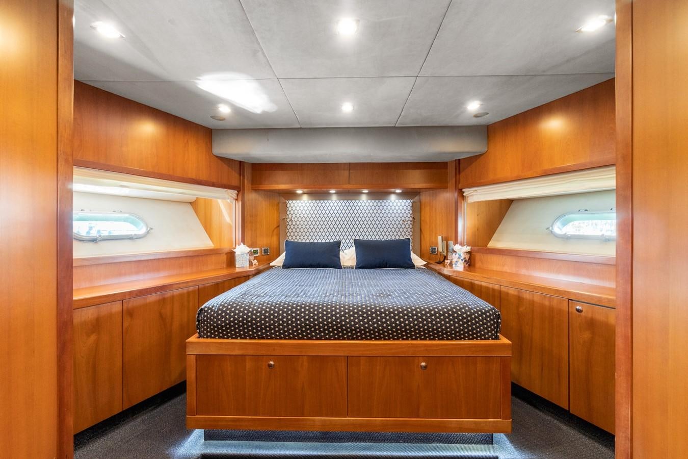 a bed in a room aboard EYE Yacht for Sale