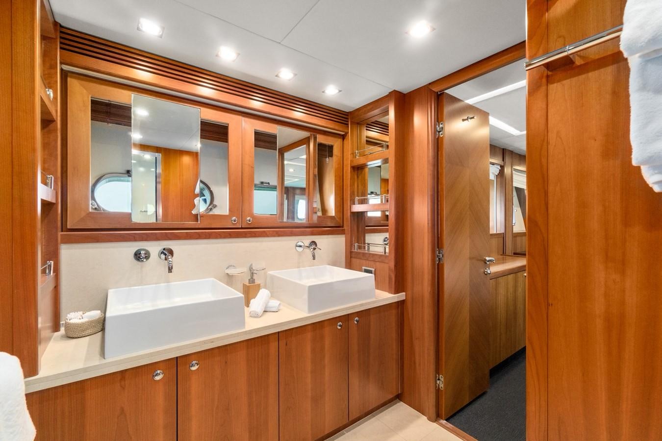 a bathroom with two sinks aboard EYE Yacht for Sale