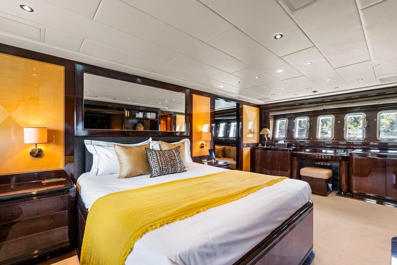a large bedroom with a large bed aboard KUY KUY Yacht for Sale