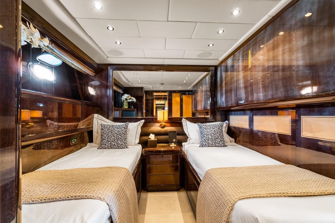 a room with a couple of beds aboard KUY KUY Yacht for Sale