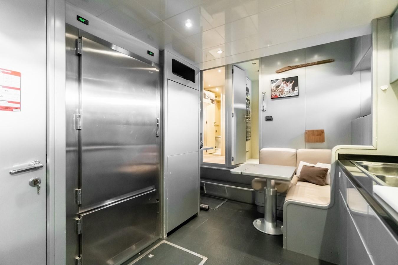 a large glass door in a room aboard KUY KUY Yacht for Sale