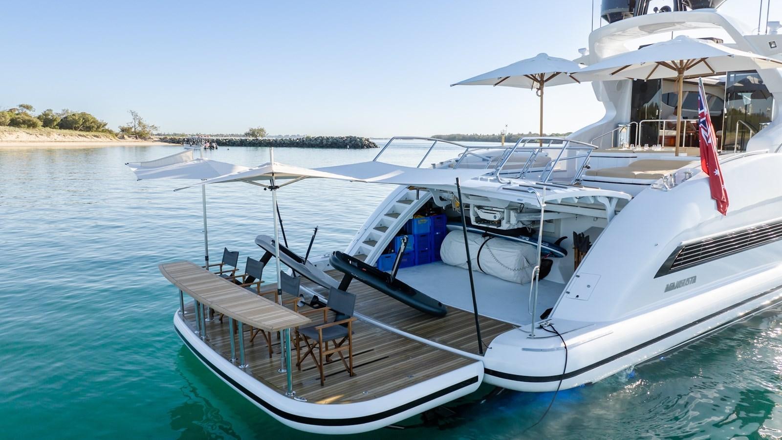 a boat on the water aboard HELLS BELLS Yacht for Sale